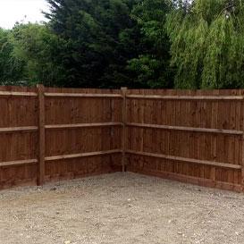 Closeboard wooden fence built by Farmyard & Fencing, that provides privacy for a residential back garden