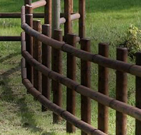 Stylish post and rail fence, handcrafted by Farm & Fencing, ideal for defining property boundaries and adding a rustic touch to any landscape