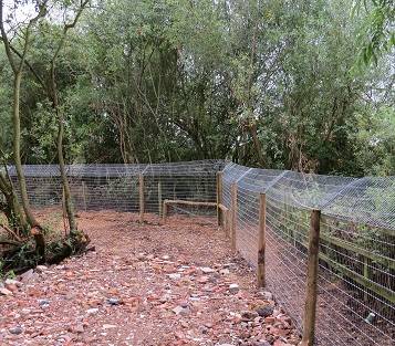 A sturdy an durable wire otter fence implemented by Farm & Fencing, designed to safeguard the fish stock of a protected  waterbody.