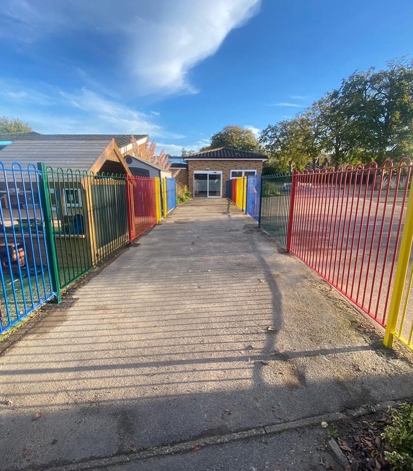 Beautifully finished iron Bowtop fence fitted by Farm & Country Fencing, that adds style and security to a residential property.