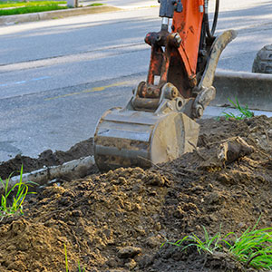 Farm & Country Fencing machine, digging a narrow trench with minimal disruption.