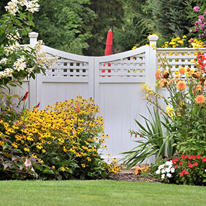 Great looking garden panel fencing custom prepared and put in place by Farm & Country Fencing, providing a beautiful touch to the boundary of a local country residence.