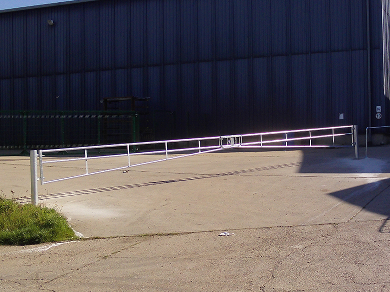 20ft barrier gates installed on sloping yard