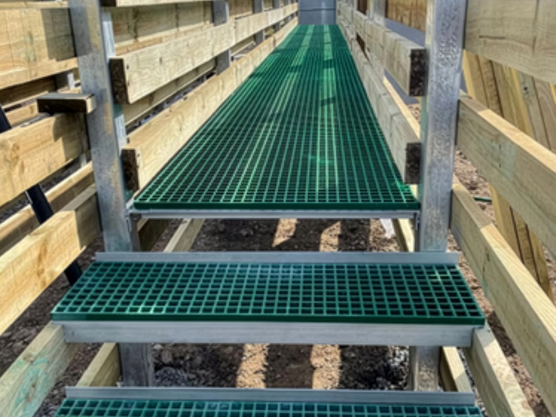Cattle corral with galvanised posts and timber boards