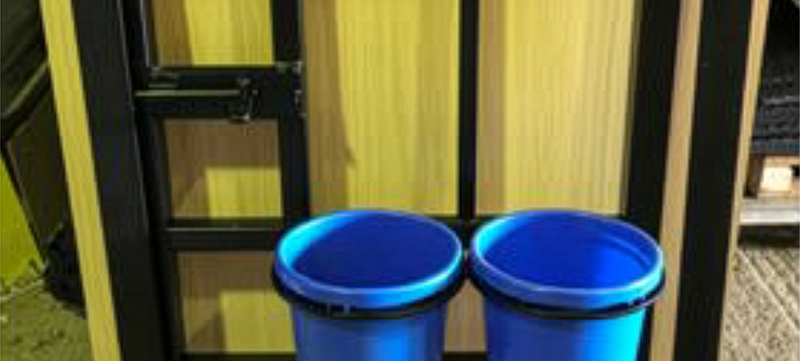 Custom fabricated goat pen gates ready for installation