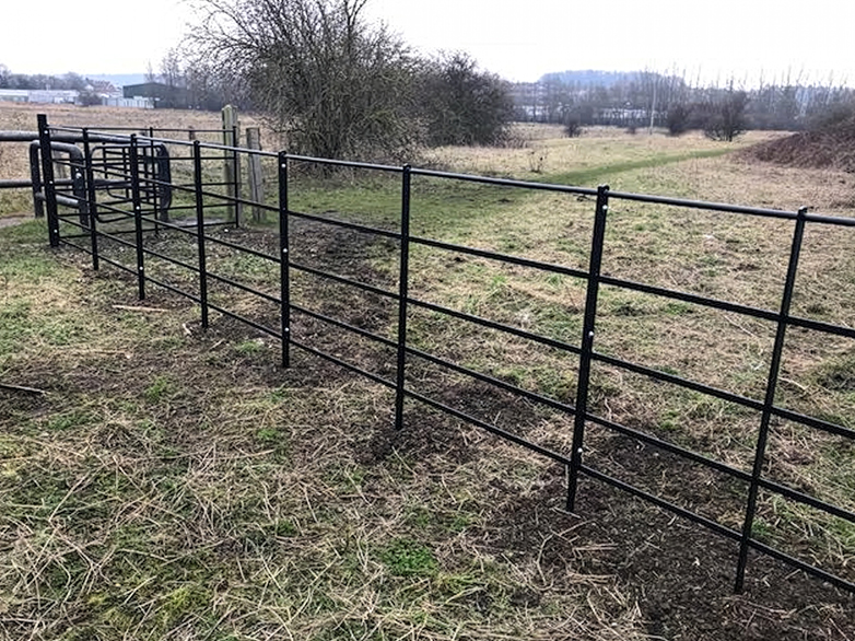 Estate fencing panels installed to replace chestnut paling fencing