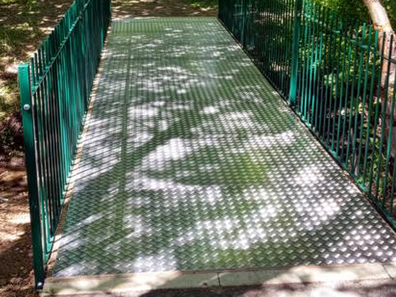 Footbridge decking with aluminium checker plate installed