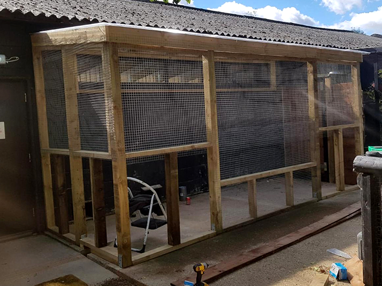 Indoor and outdoor meerkat enclosures connected by underground tunnel