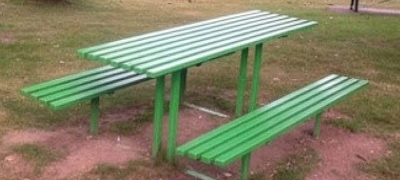 Restored park benches and bins after refurbishment
