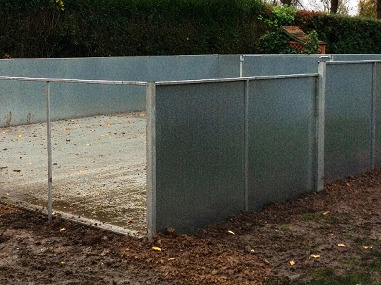 Porcupine enclosure with double gated entrance