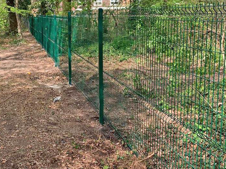 V Mesh Fencing Installed in Wooded Area