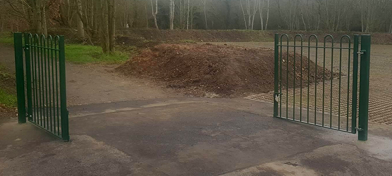 Bow-Top Gates in Chicane Formation at Overflow Car Park