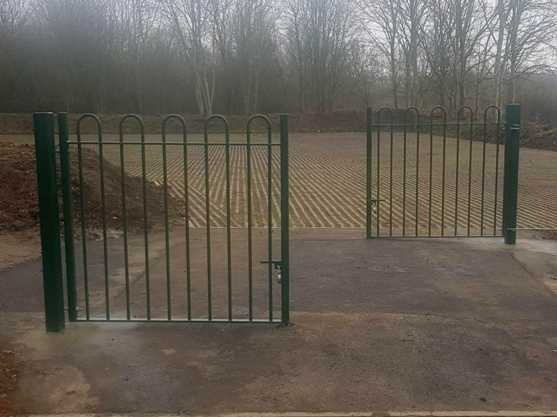 Installed chicane fencing system with bow-top gates