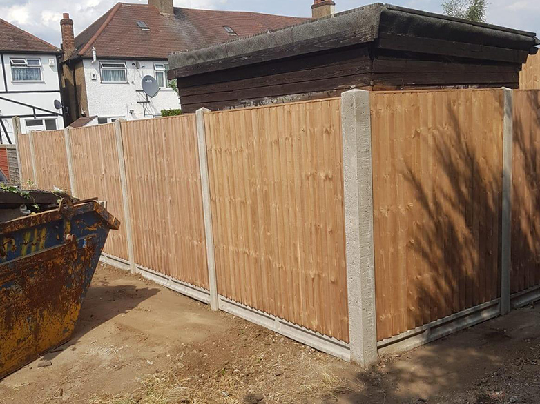 Finished Concrete Fence Extension with Closeboard Panels