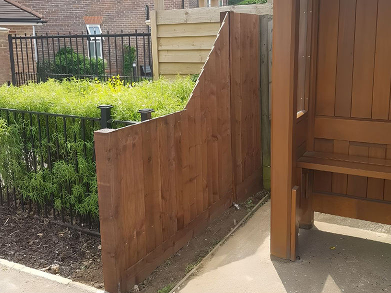 Angled custom closeboard fence at Harpenden bus stop