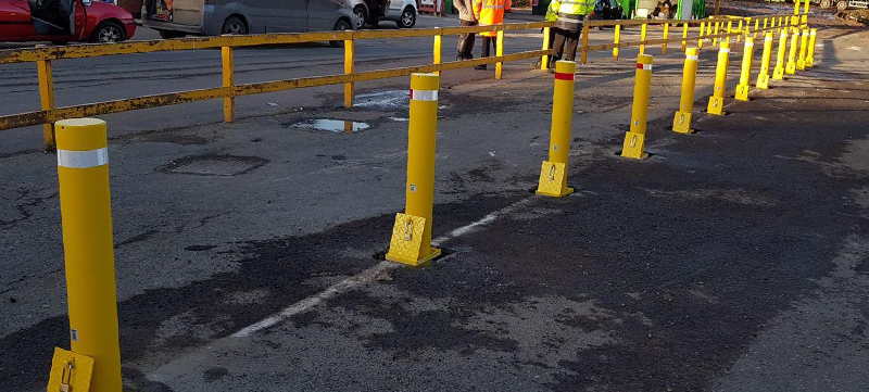 Installed heavy-duty drop bollards on public roadway