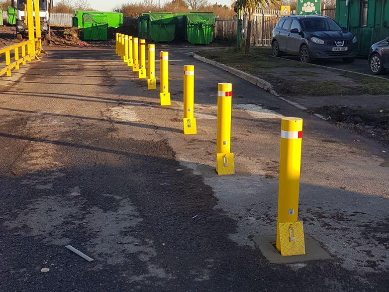Row of newly installed drop bollards