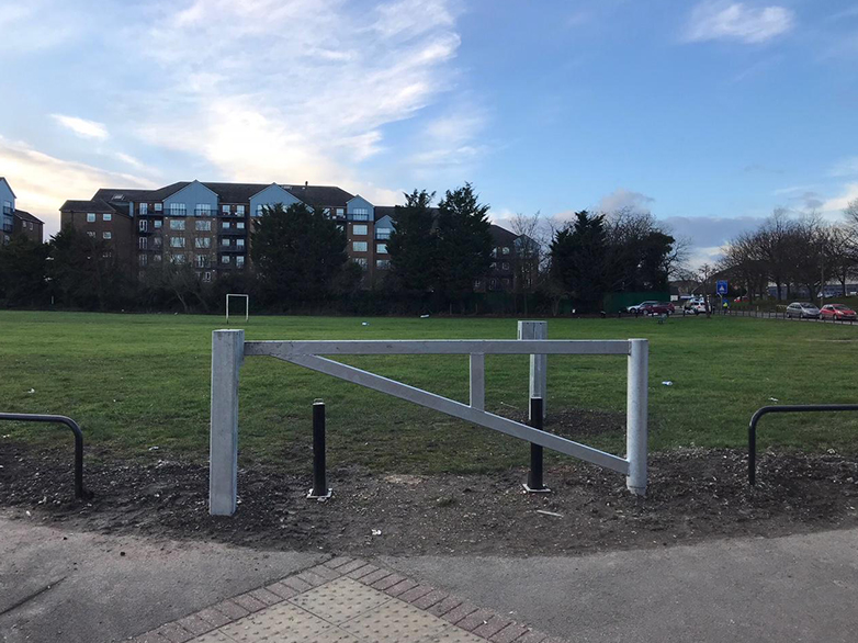 Hingeless barrier and lock post system installed at kerb