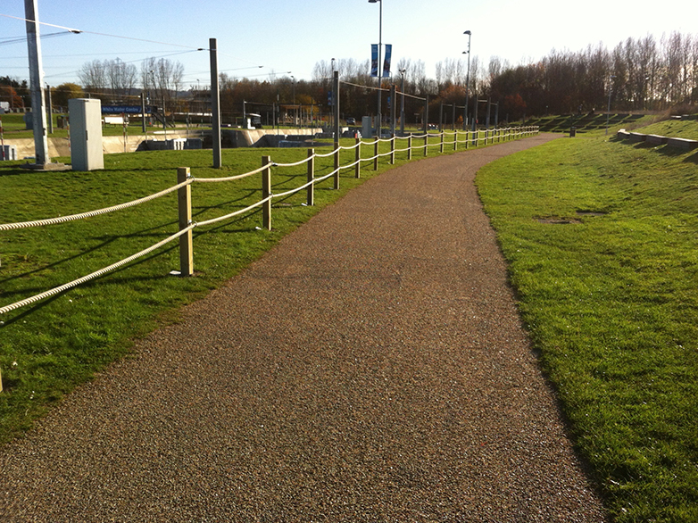 Post and Rope Barrier Installed with Ground Socket Lids