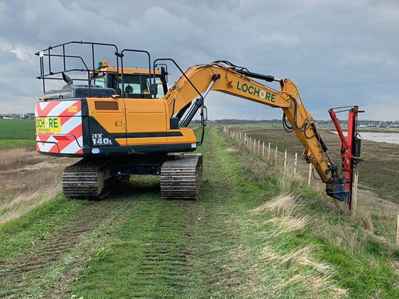 Close-up of Tornado Wire and Chestnut Posts