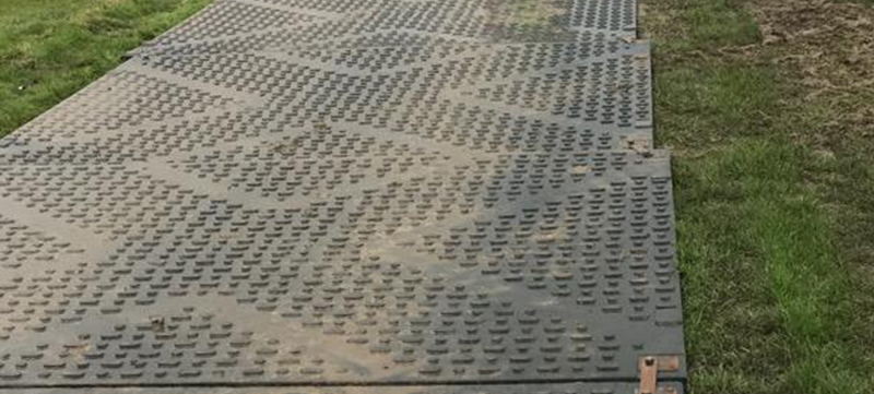 Trackway matting installed to protect grass from machinery