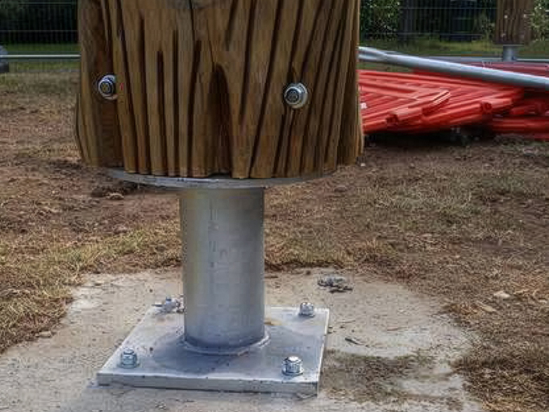 Reinstalled totem poles with new steel bases