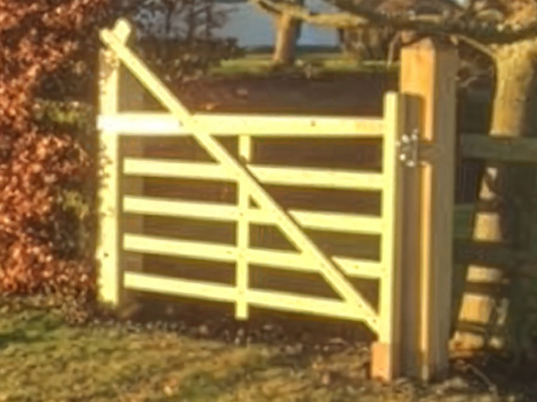 Installed timber 5 bar estate gates at property entrance