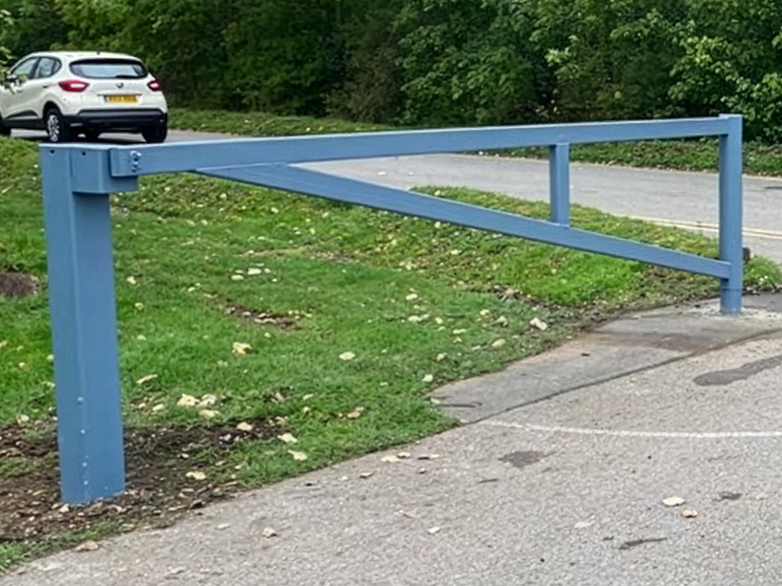 Installed steel hingeless barrier gate at entrance