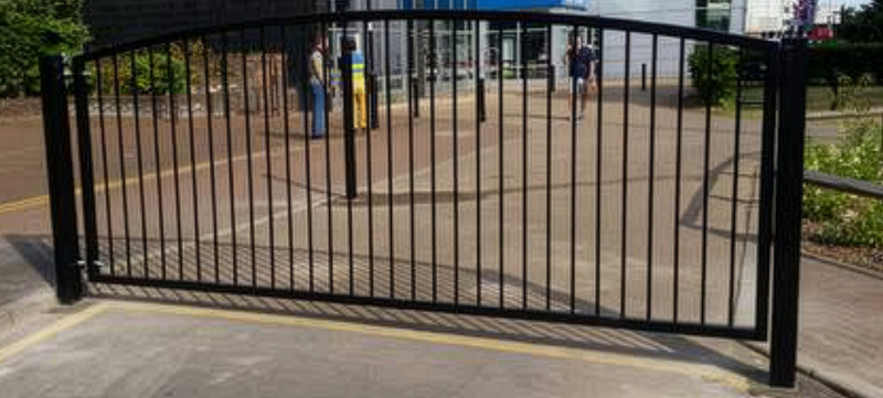 Curved Top Vertical Bar Gate Installed Outside Romford Library