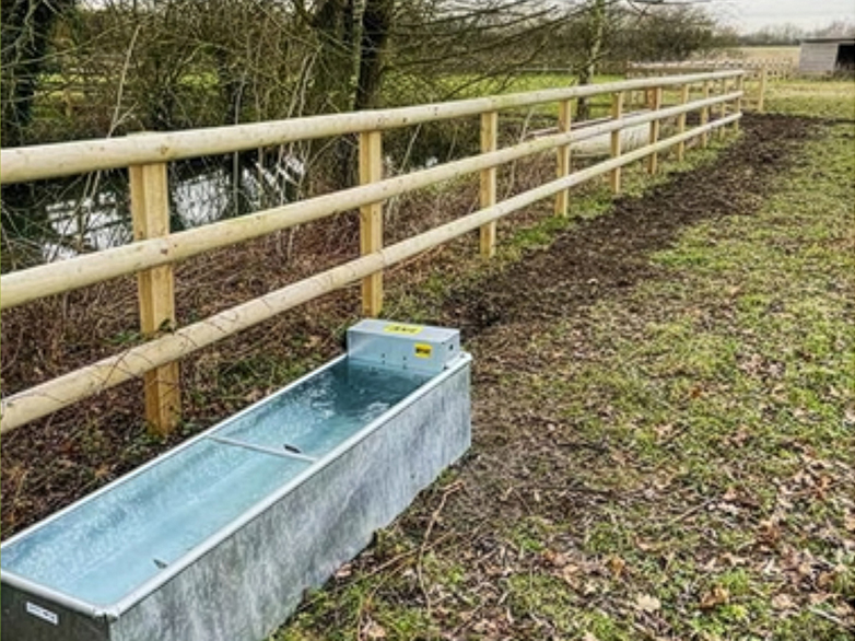 Completed paddock with water trough connections and fencing