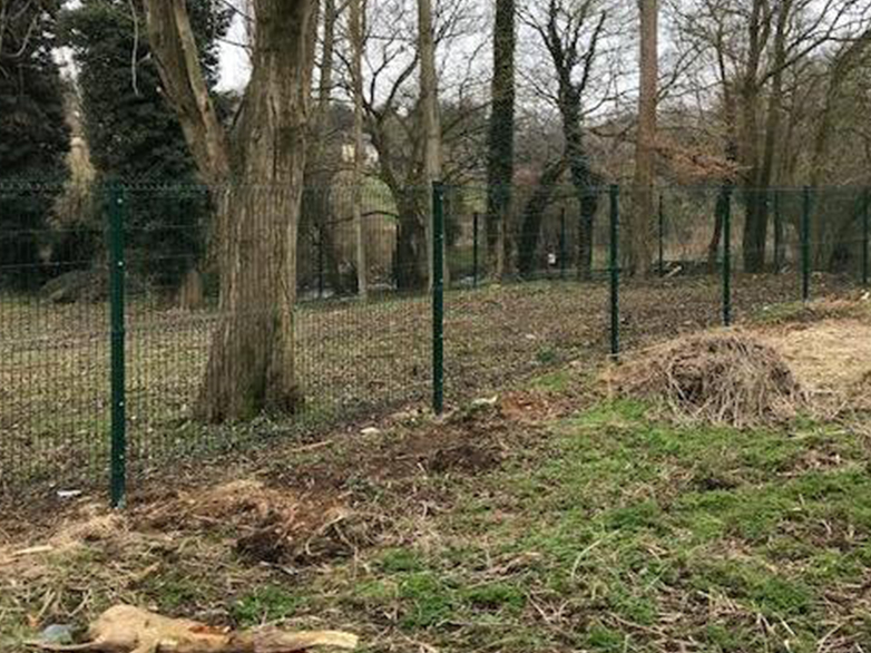 Mesh panels along boundary of nature reserve